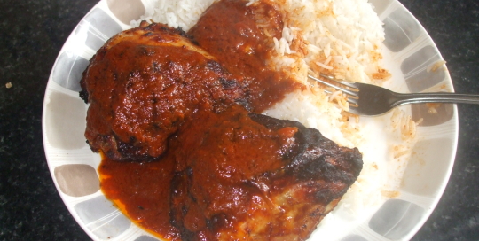 Rice and crispy BBQ chicken with hot BBQ sauce