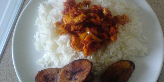 plain rice with fried plantain and egg stew