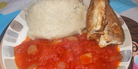 banku, fried red tilapia with spicy tomato gravy